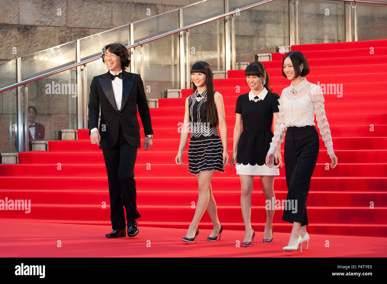 Tokyo, Japan. 22nd Oct, 2015. (L to R) Cast and crew of the movie ''WE ARE Perfume WORLD TOUR 3rd DOCUMENT'' producer Shiro Yamamoto and artists KASHIYUKA, a-chan and NOCCHI pose for the cameras during the Opening Red Carpet for the 28th Tokyo International Film Festival (TIFF) at Roppongi Hills Arena on October 22, 2015, in Tokyo, Japan. The Film Festival will run through until Saturday 31. Stock Photo