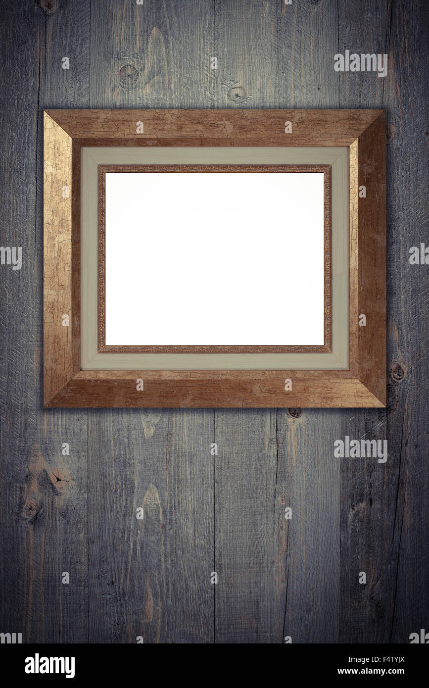Old picture frame on vintage wood wall Stock Photo - Alamy