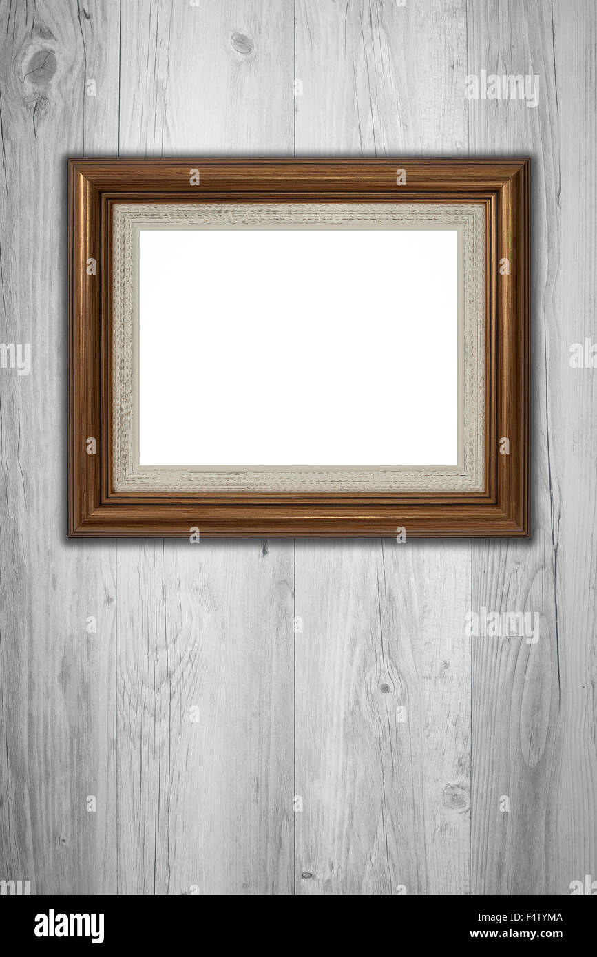 Old picture frame on vintage wood wall Stock Photo - Alamy