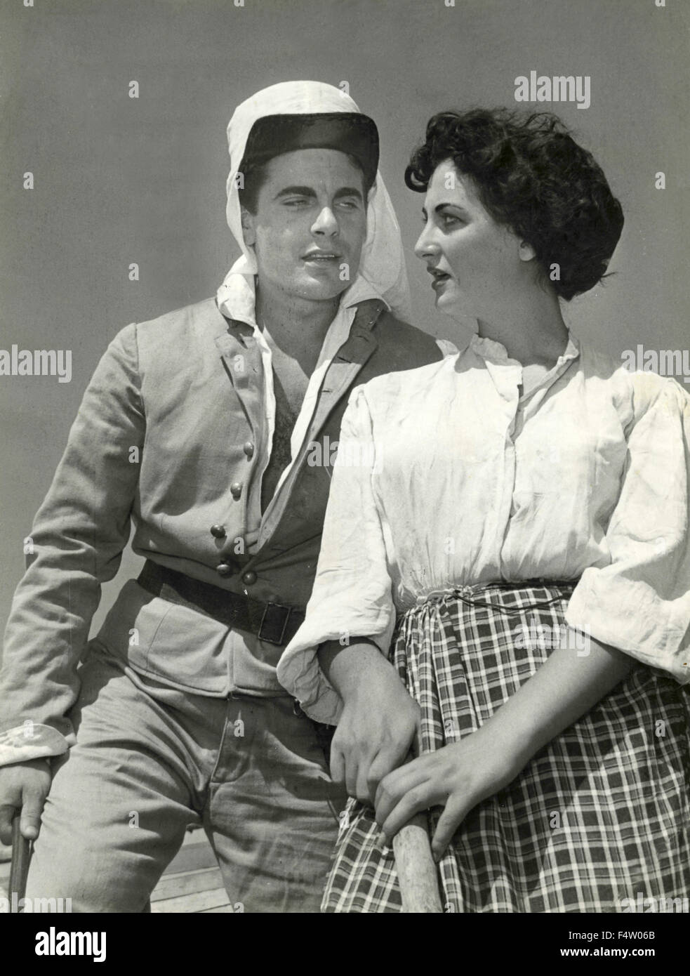 A couple of actors in costume in a scene from a movie, Italy Stock Photo