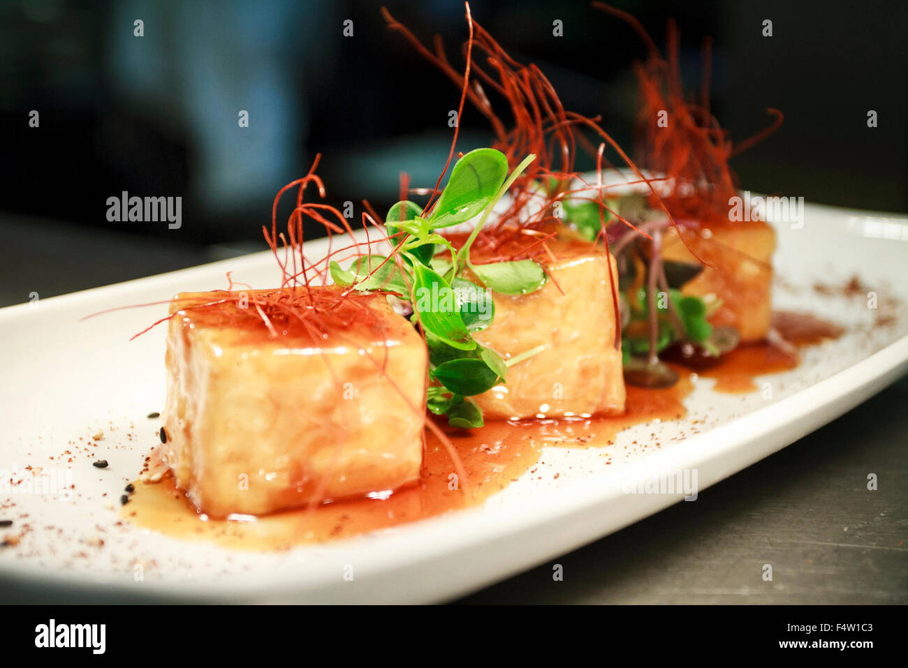 Pan Fried Tofu with teriyaki sauce Stock Photo Alamy