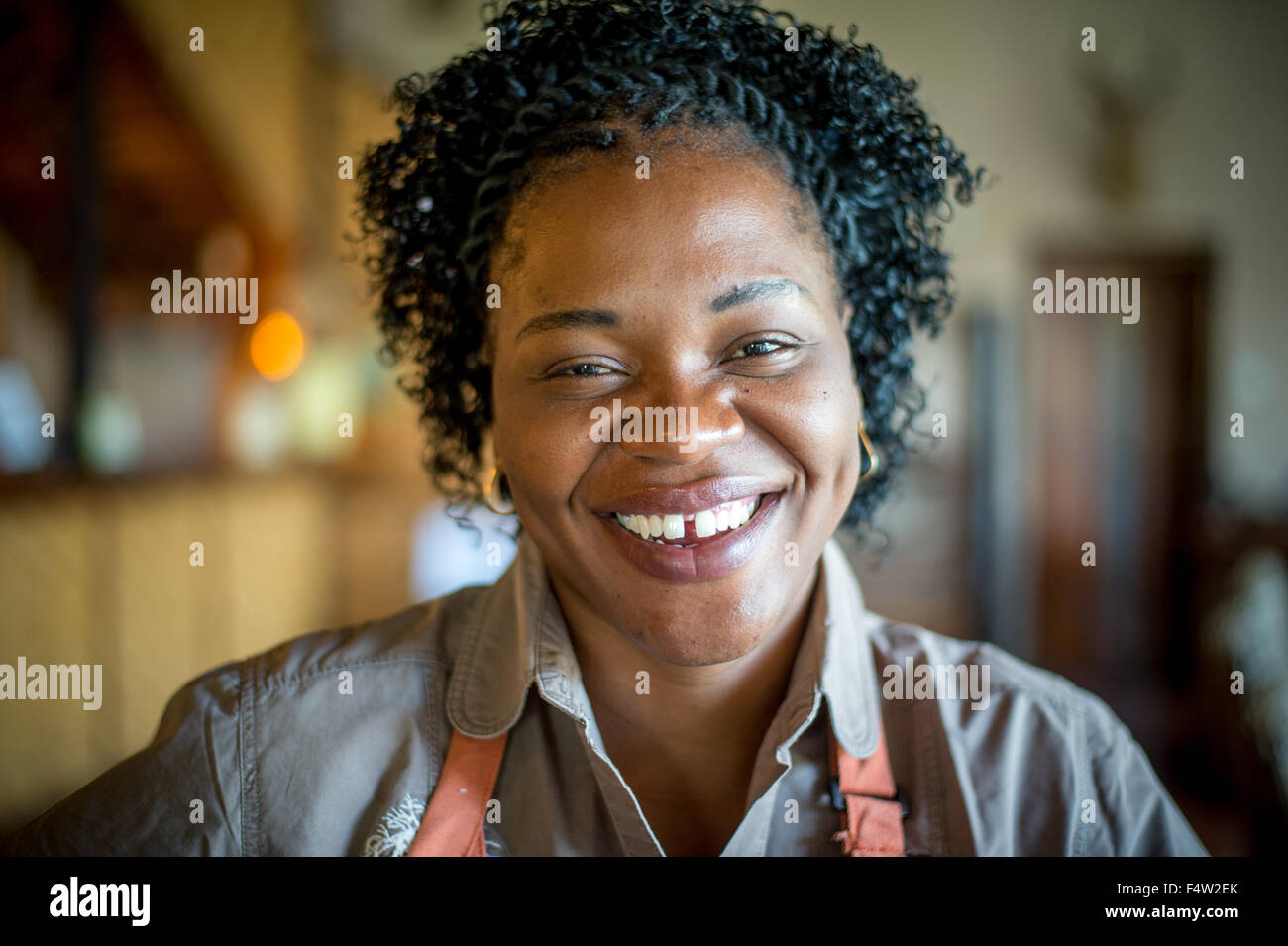Smiling african woman hi-res stock photography and images - Alamy