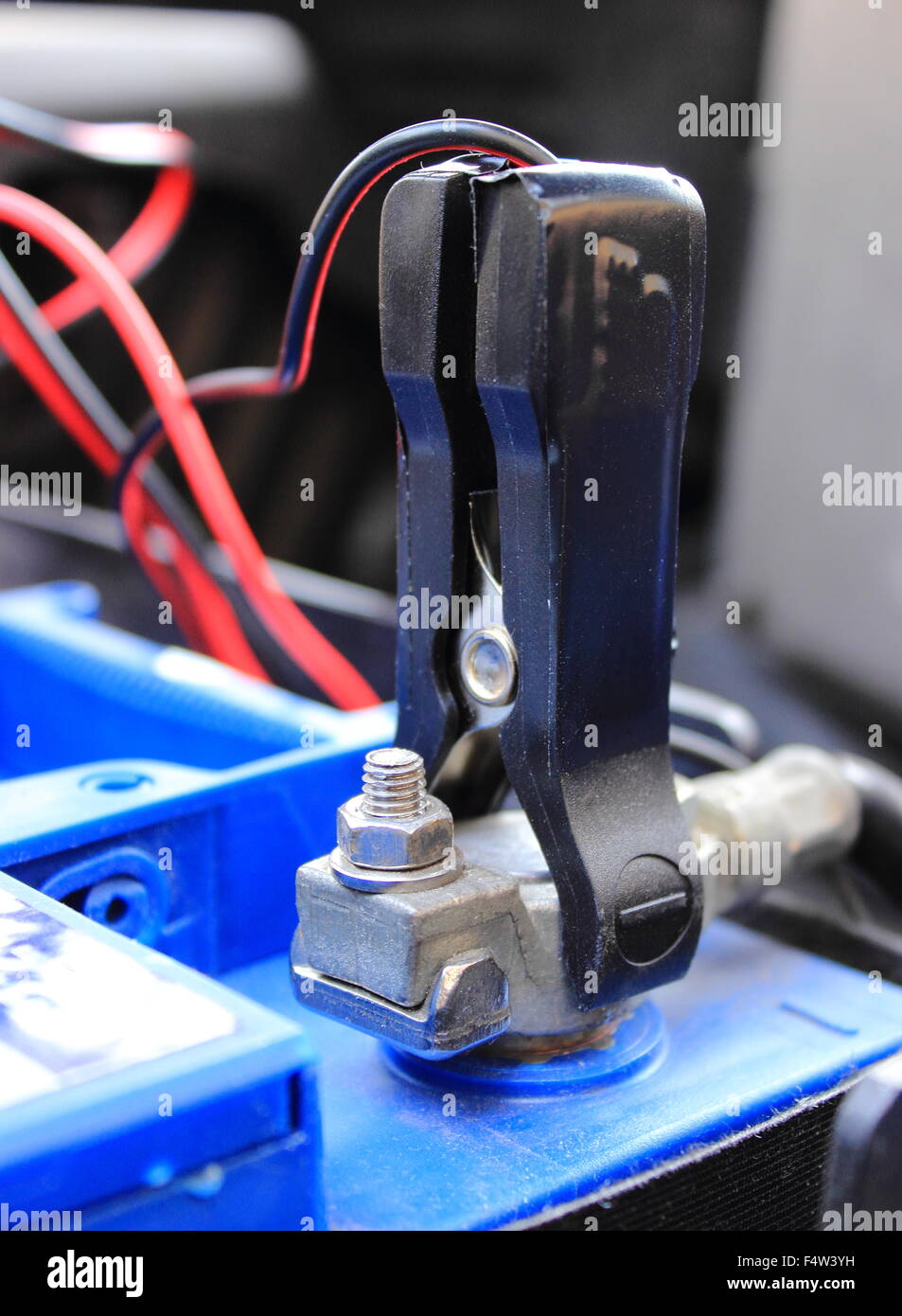 Charger with cables uses to charge old dead car battery Stock Photo Alamy