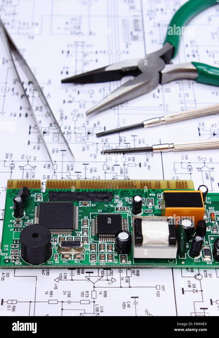 Printed circuit board with electrical components and precision tools ...