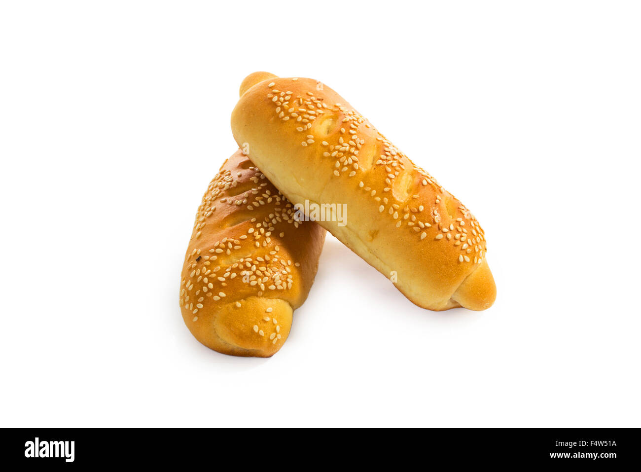 Hot bun of light wheat bread topped by sesame seeds Stock Photo