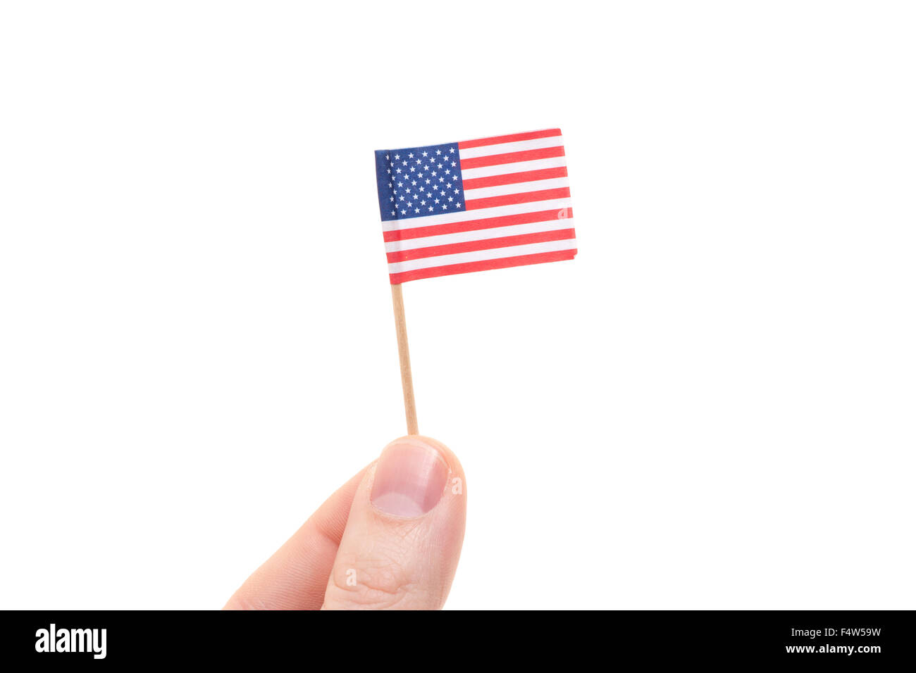 Hand holding US flag. All on white background Stock Photo - Alamy