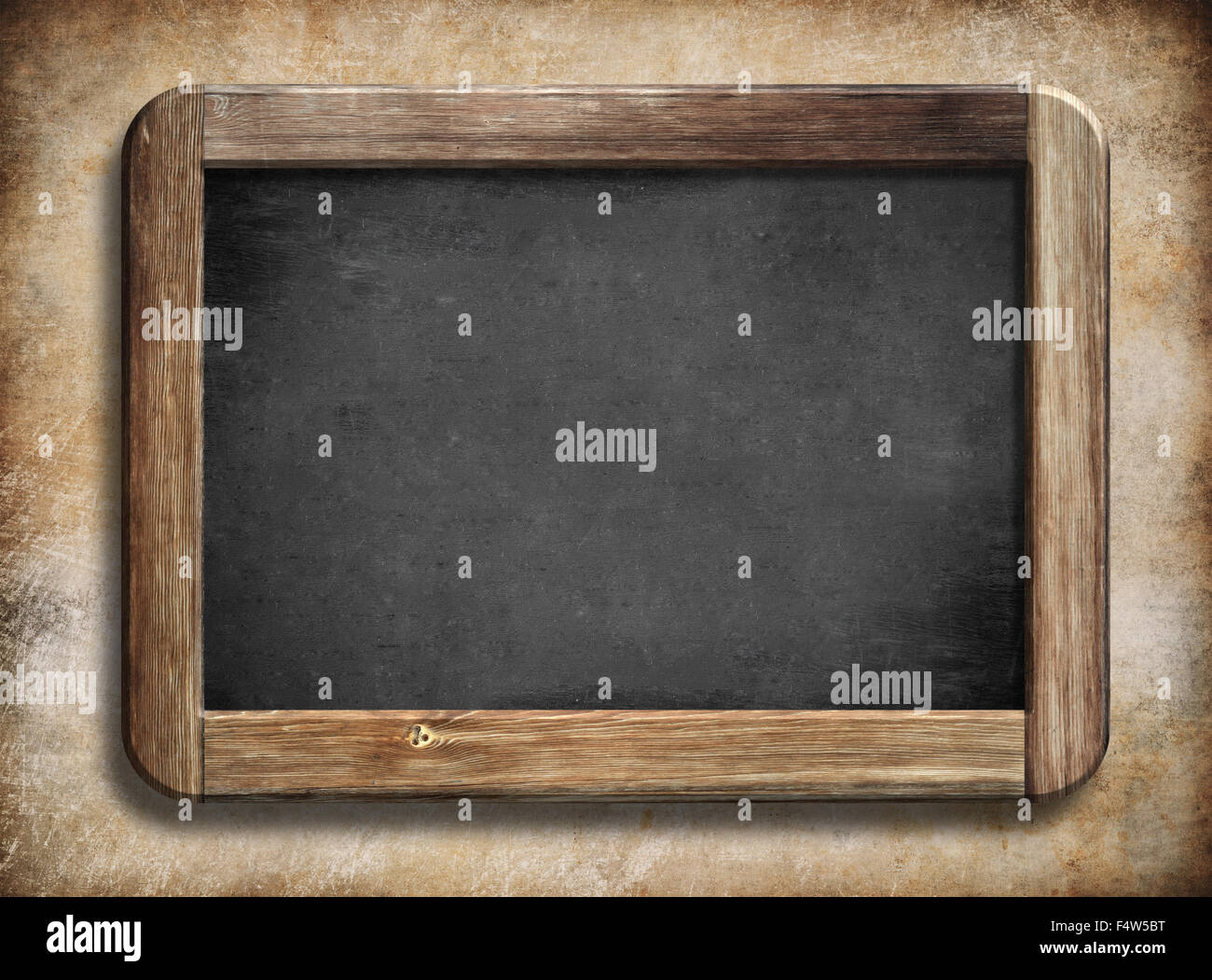 old vintage blackboard with wooden frame on grunge background Stock