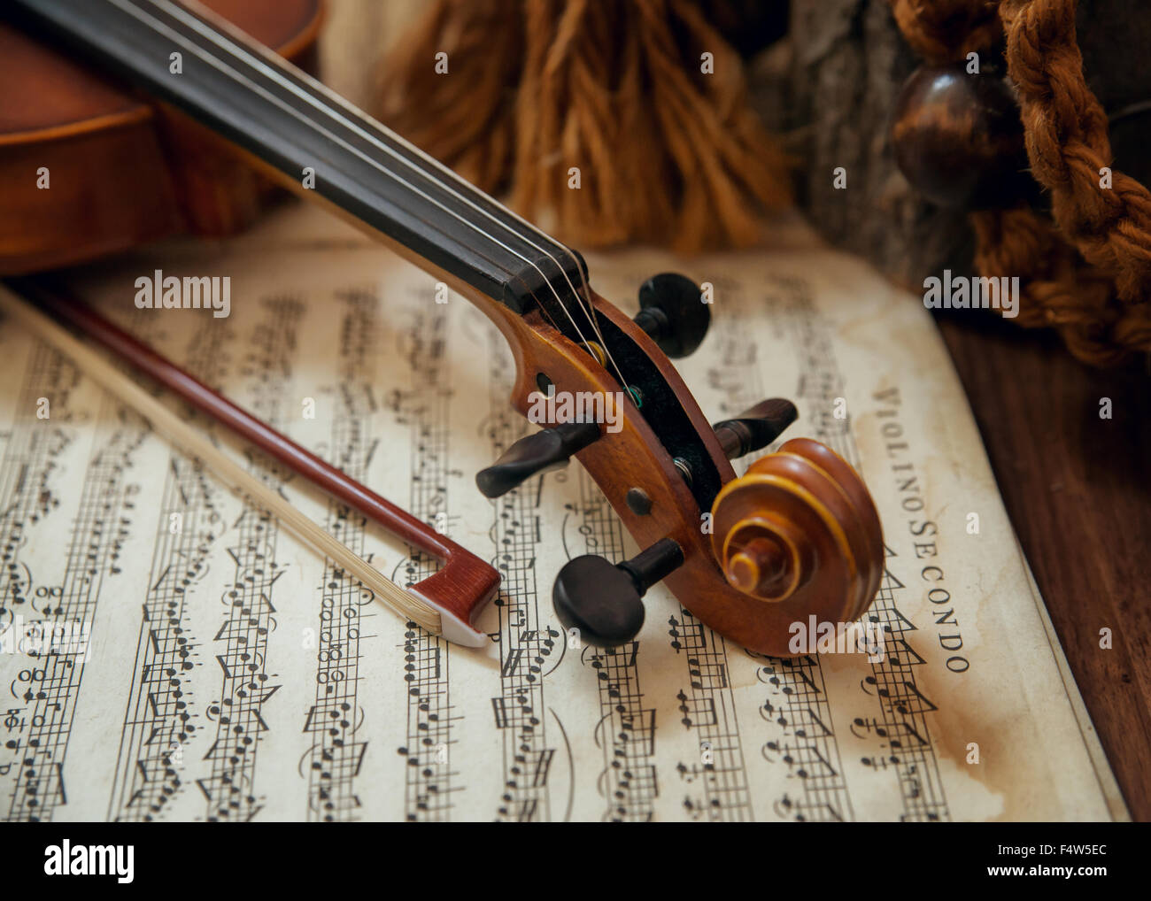 Violin head on sheet music Stock Photo