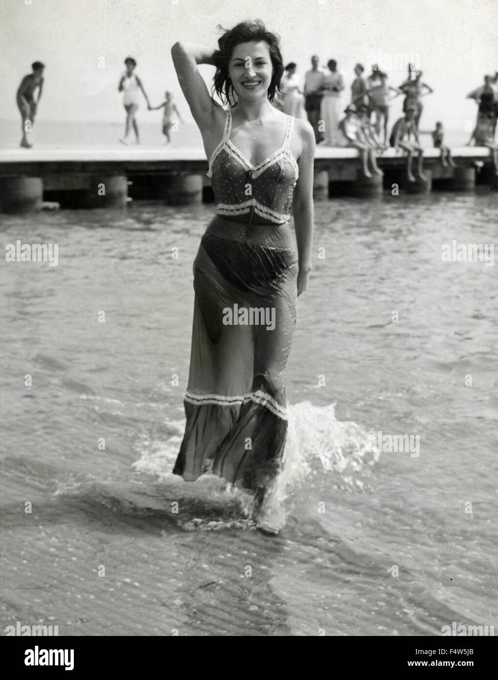 The Italian actress Teresa Pellati out by the waters of Venice Lido, Italy Stock Photo