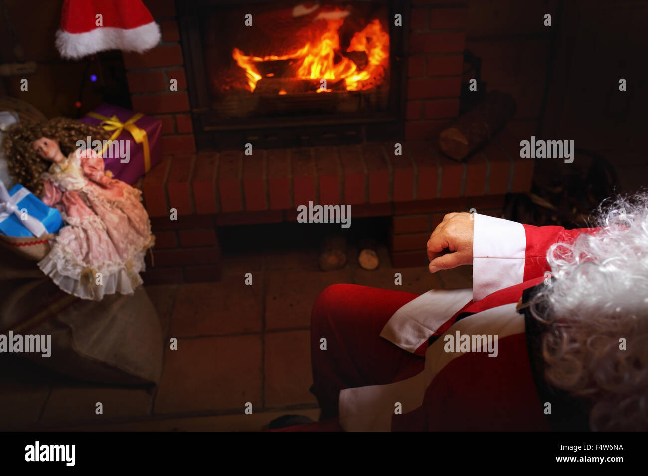 Santa Claus Rests In Hut With A Fireplace Stock Photo 89064566