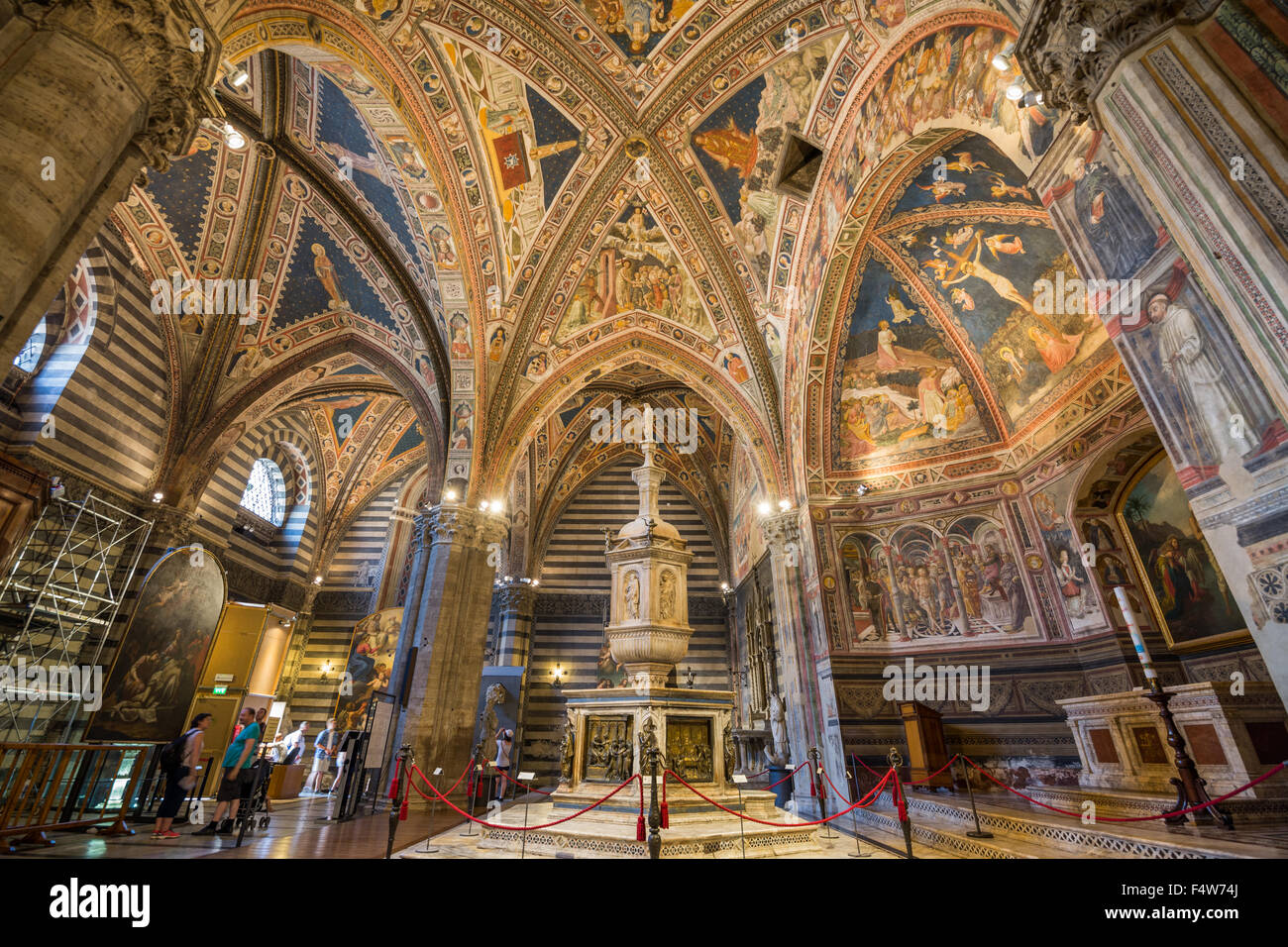 Interier of the baptisterium in The Duomo Cathedral in Siena, Tuscany ...