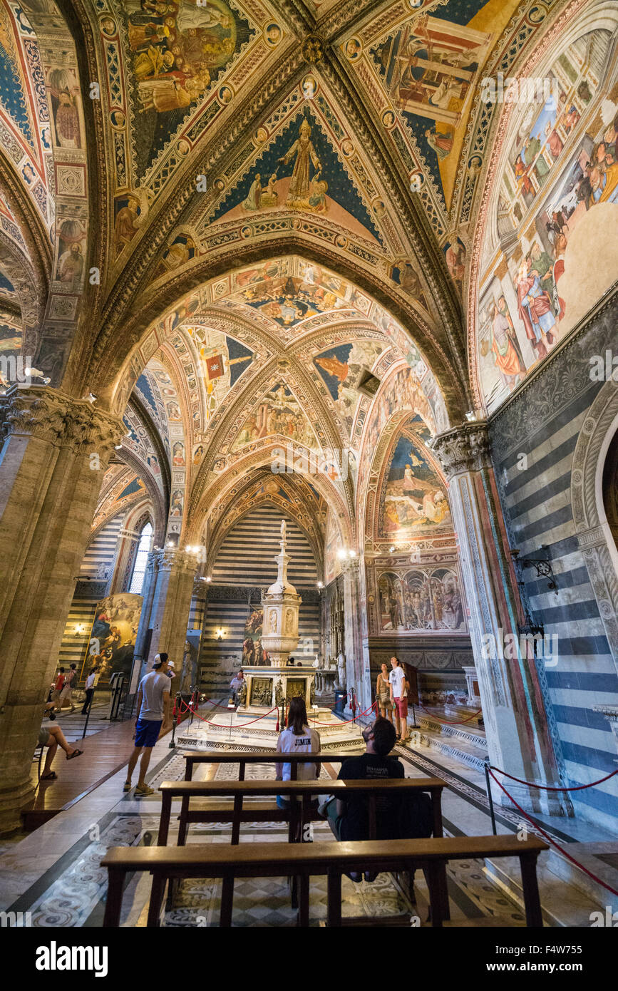 Interier of the baptisterium in The Duomo Cathedral in Siena, Tuscany ...