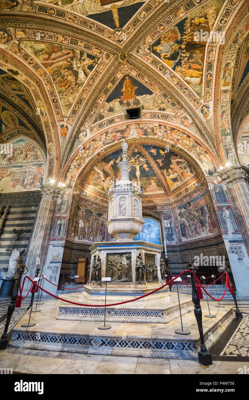 Interier of the baptisterium in The Duomo Cathedral in Siena, Tuscany ...
