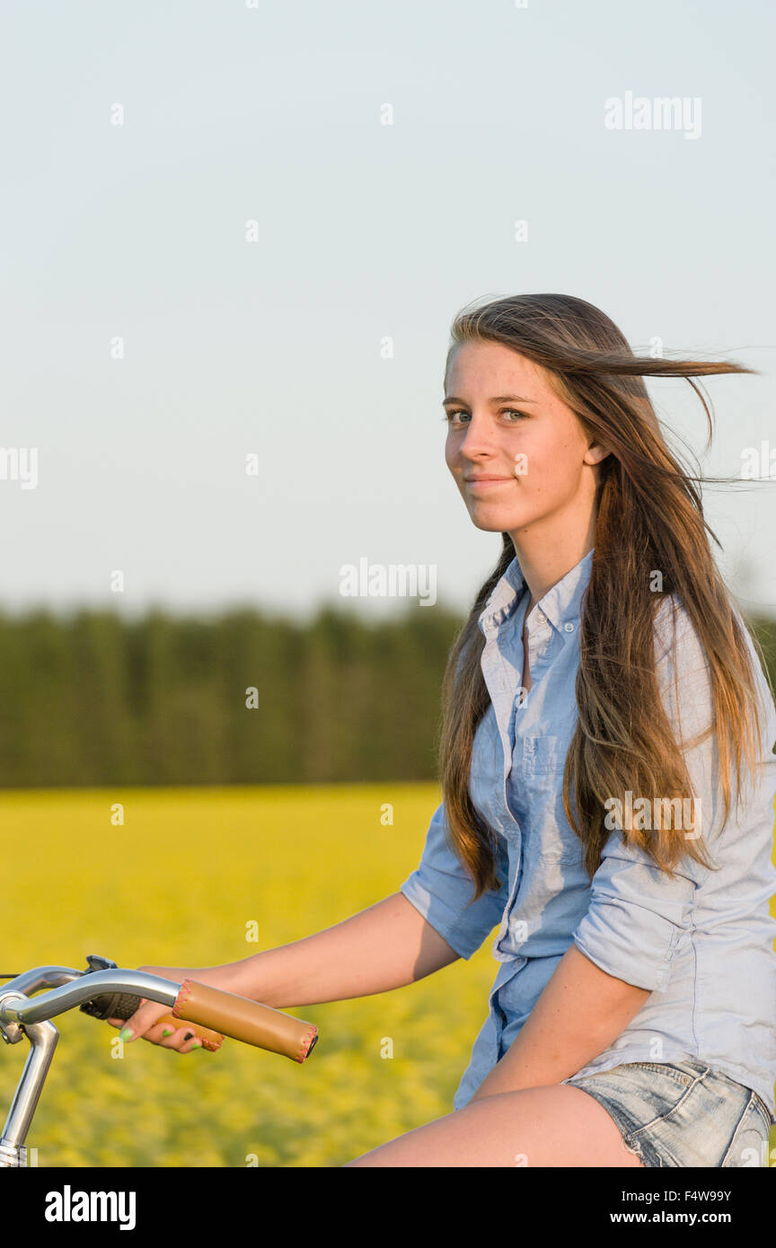 Teenage girl bike sitting on hi-res stock photography and images - Alamy