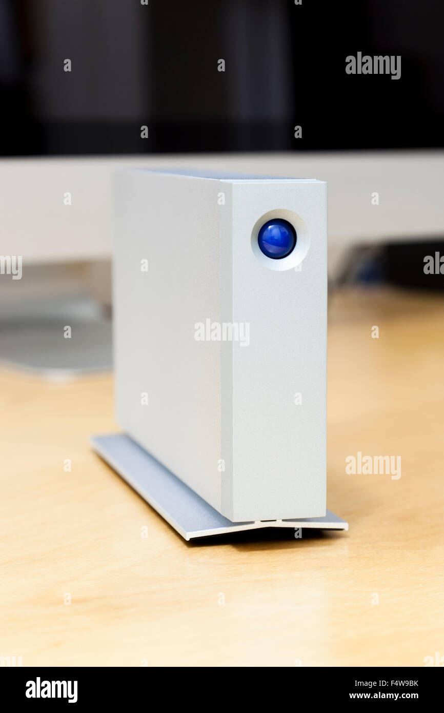 LaCie d2 Thunderbolt 2 3TB external hard drive. Front view with the blue LED power button Stock Photo