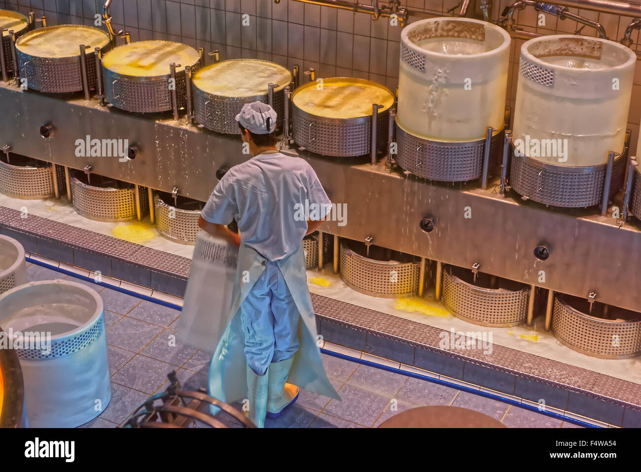 Production of Gruyere cheese at the Maison du Gruyere, a famous cheese