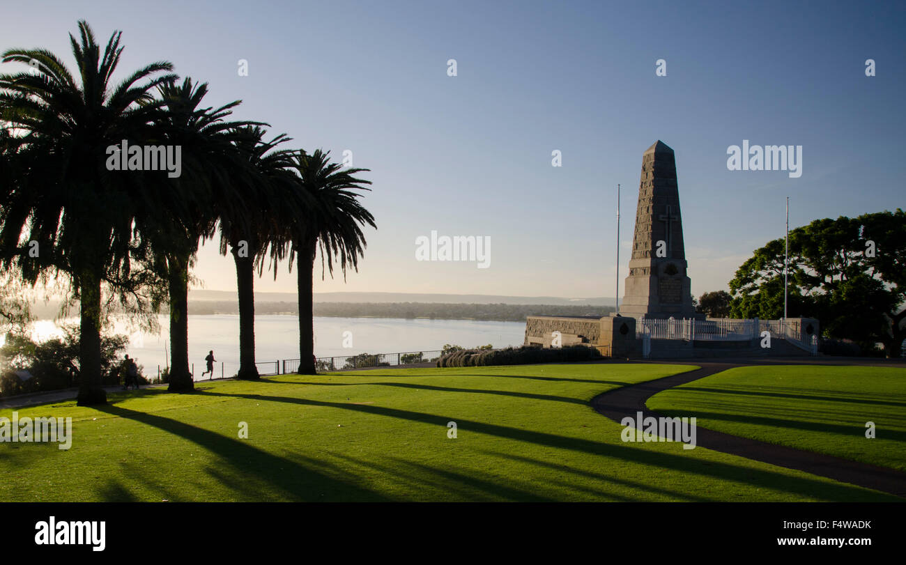 An early morning runner in Kings Park near the ANZAC memorial and overlooking the Swan River in Perth, Western Australia Stock Photo