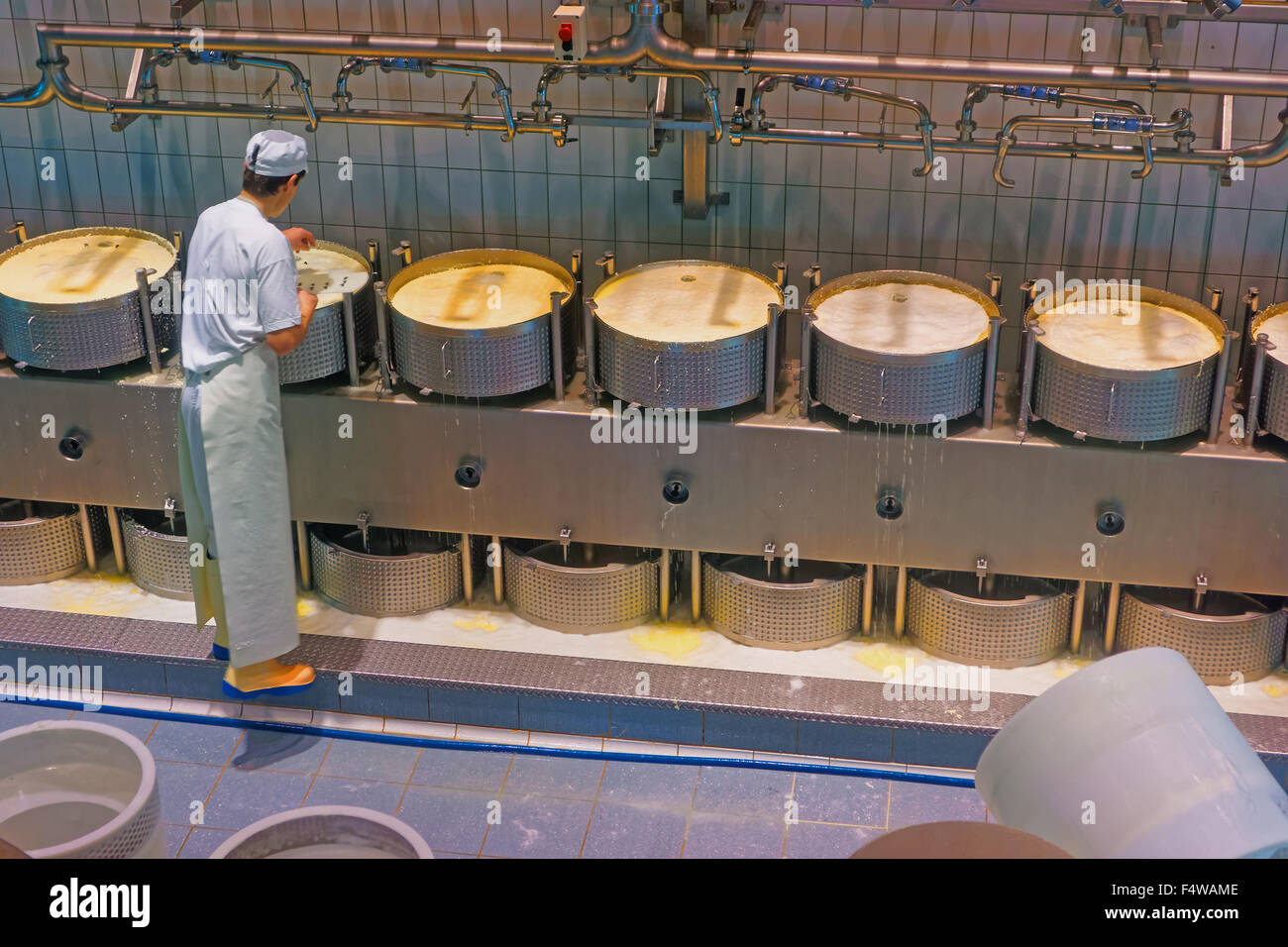 GRUYERE, SWITZERLAND DECEMBER 31, 2014 Worker of the cheese making