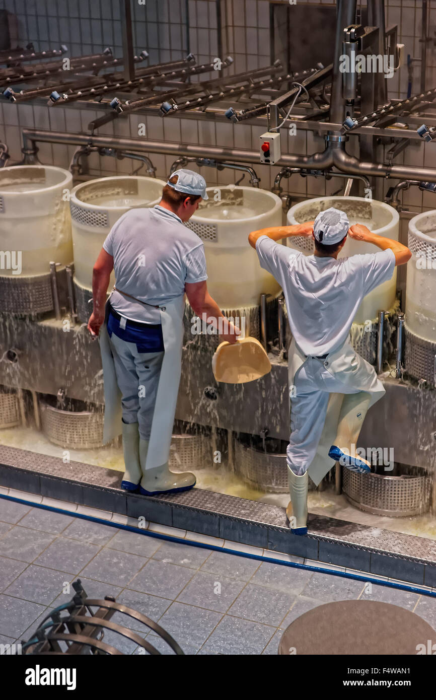GRUYERE, SWITZERLAND DECEMBER 31, 2014 Cheese makers at work during