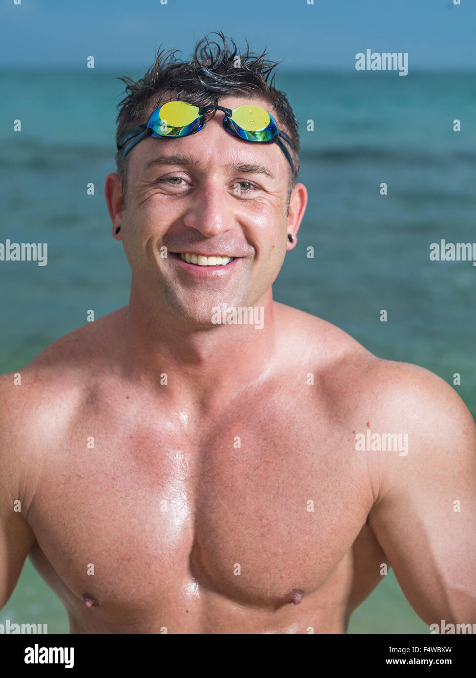 Muscular open water swimmer triathlete outside Stock Photo