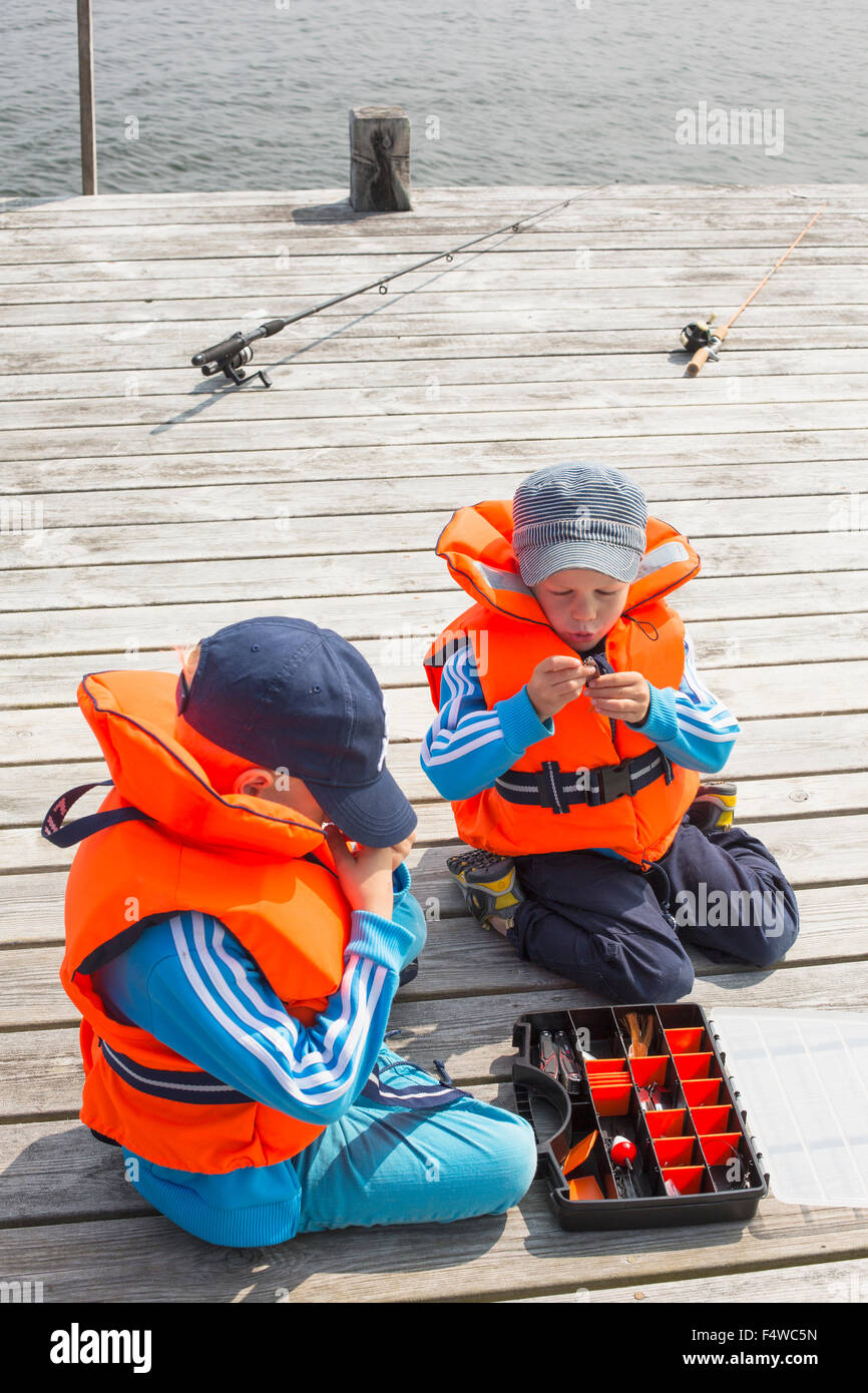 Two boys fishing hi-res stock photography and images - Alamy