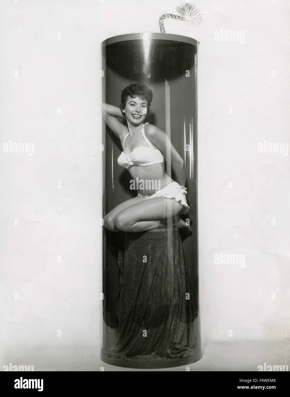 The Puerto Rican actress Rita Moreno in a twopiece swimsuit in a white