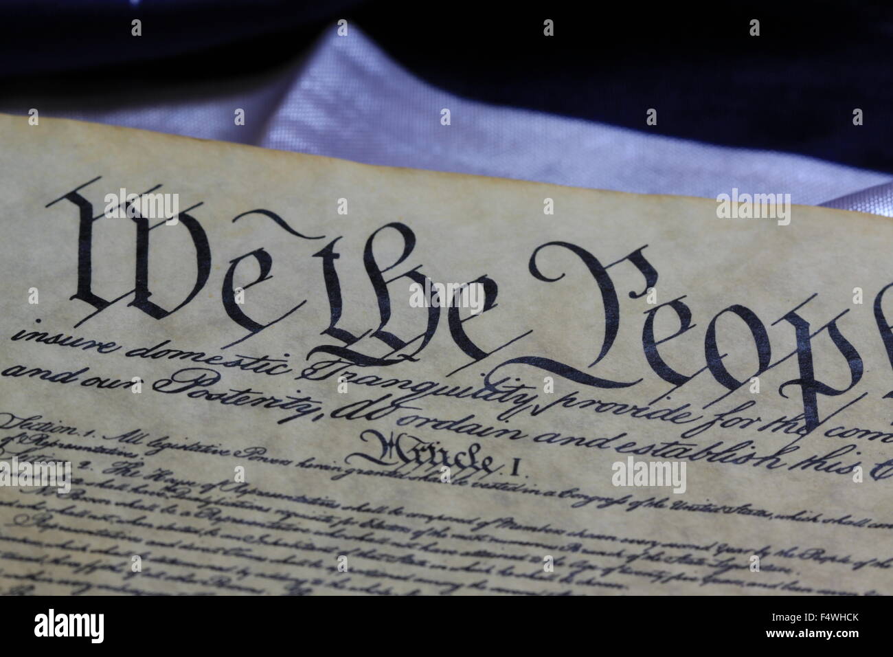 Historical Document US Constitution - We The People with American Flag Stock Photo