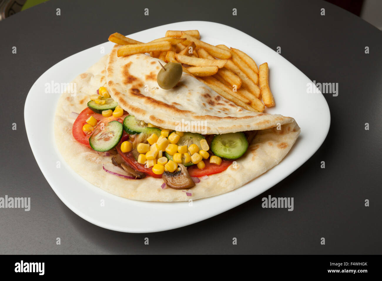tortilla with vegetables and french fries Stock Photo
