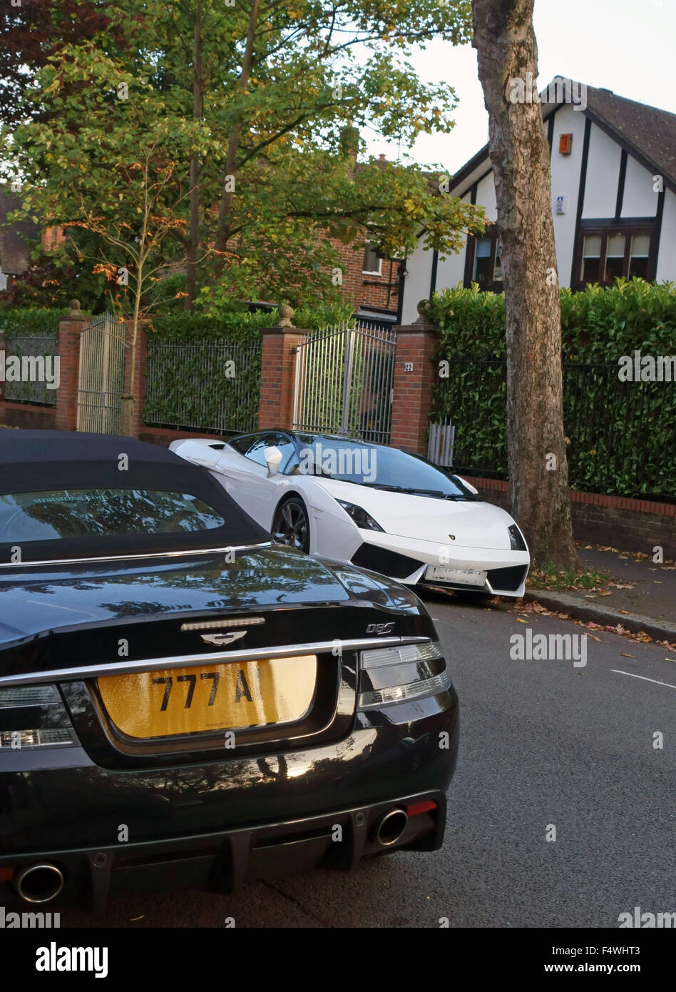 Luxury cars parked in street in wealthy North London neighbourhood