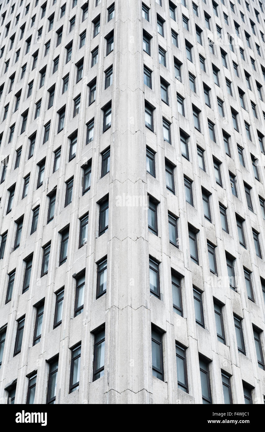 The facade of a faceless concrete office block on Sauchiehall Street, Glasgow, Scotland, UK. Stock Photo