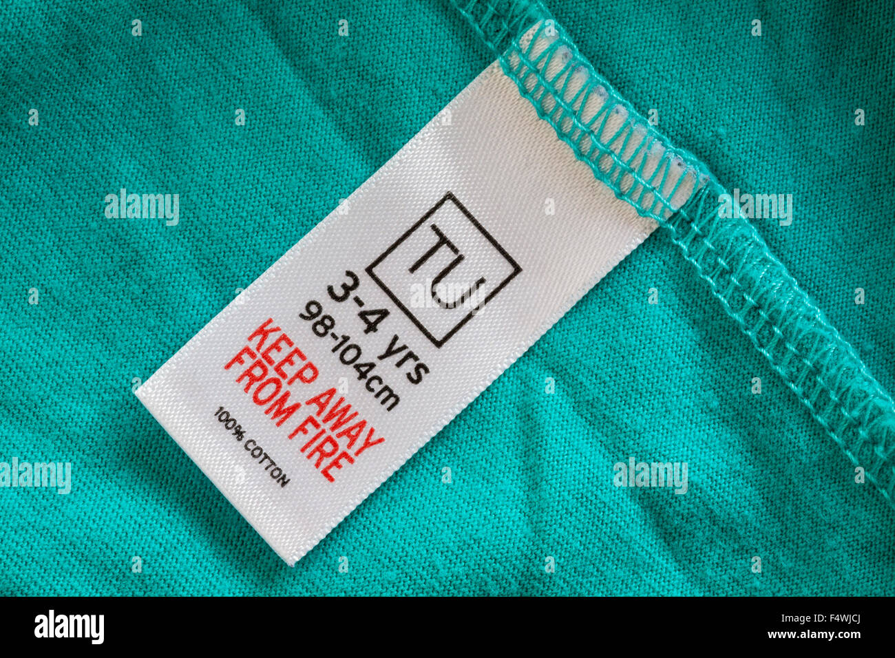 keep away from fire label in TU 100 cotton child's clothing for ages 3