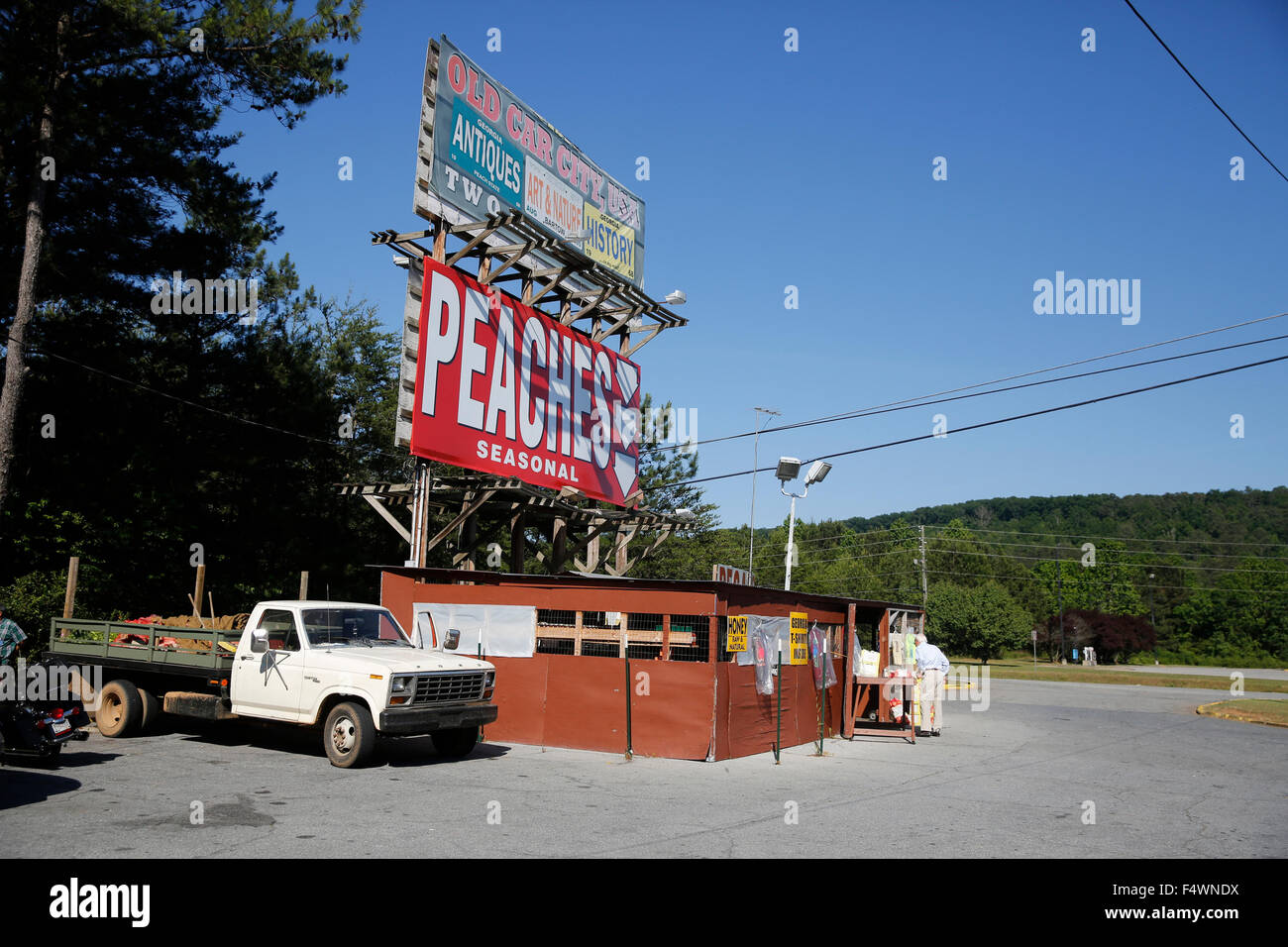 Signs for roadside peach stand in Northern Stock Photo Alamy