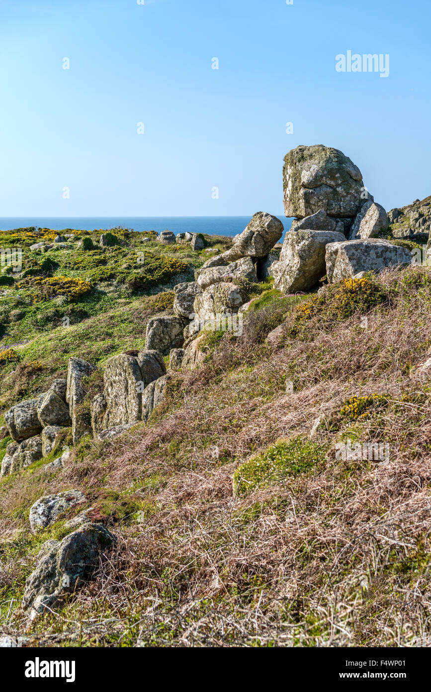 Scenic rock formations in a coastal landscape at Lands End, Cornwall, England, UK Stock Photo