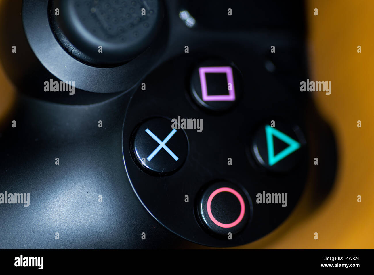 A closeup picture of a playstation 4 controller Stock Photo