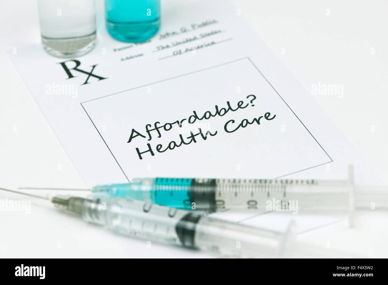 Affordable health care prescription with syringes and vials. Stock Photo