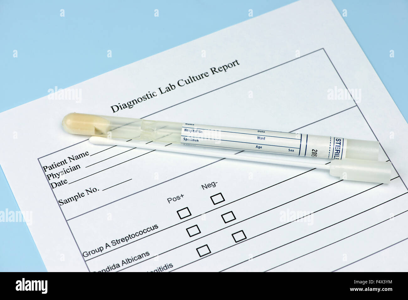 Diagnostic culture swab and holder with lab culture report. Stock Photo