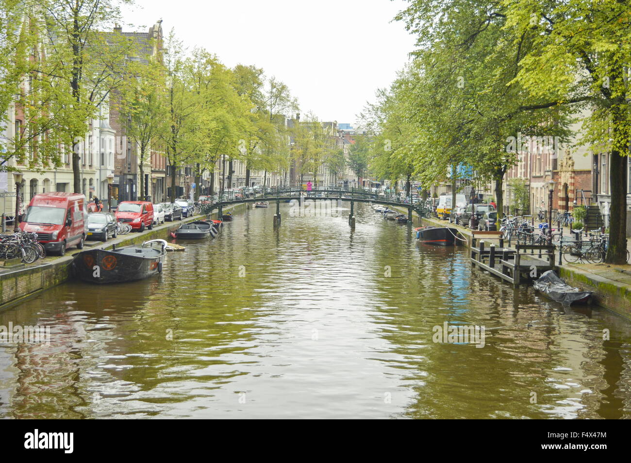 Amsterdam city canal on a cloudy and cold autumn day Stock Photo