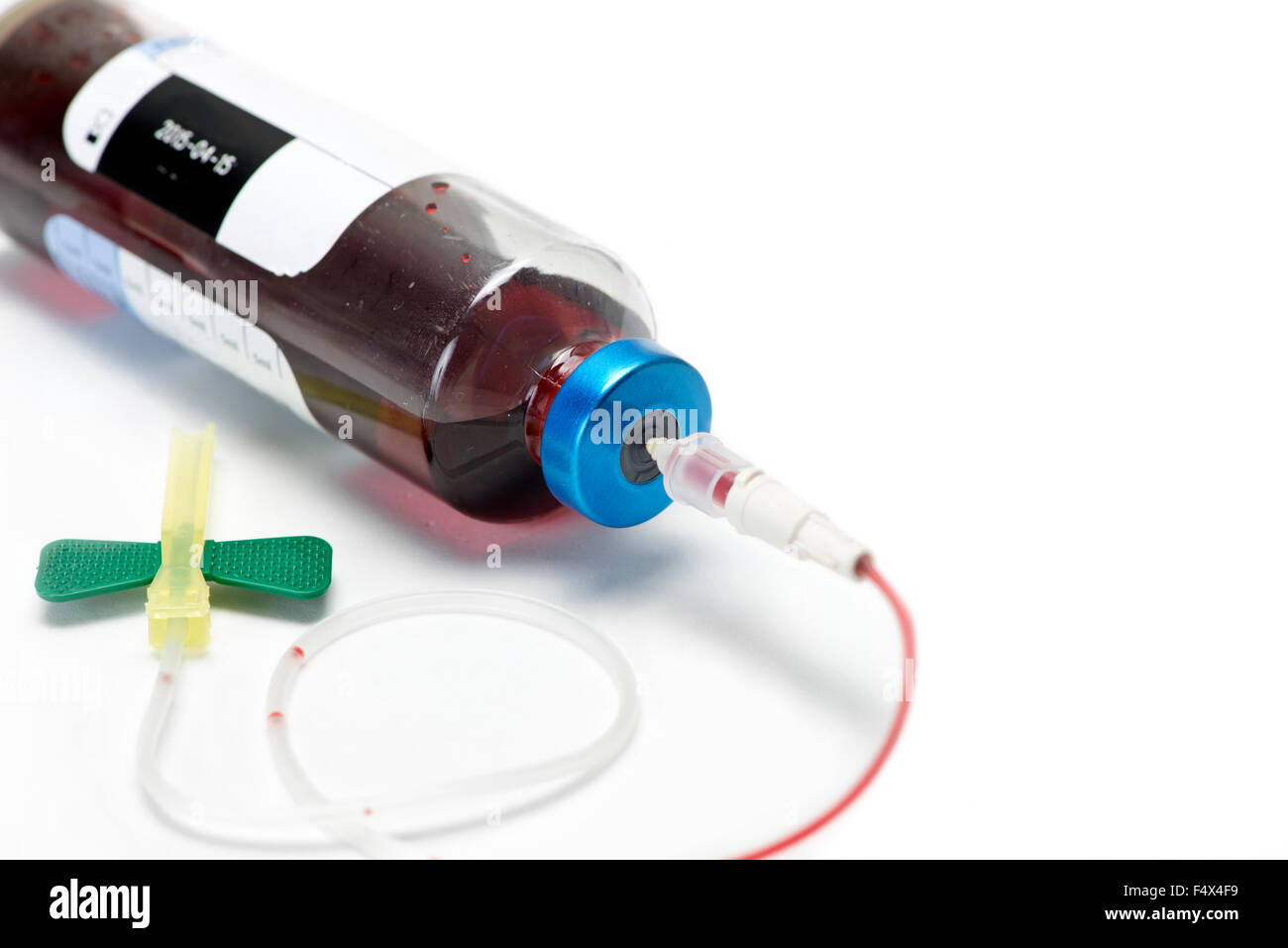 Aerobic blood culture bottle with 21 gauge butterfly catheter and copyspace. Stock Photo