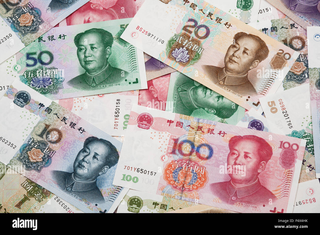 Background collage of Chinese Rmb bank notes  or Yuan with Chairman Mao on the front of each bill Stock Photo