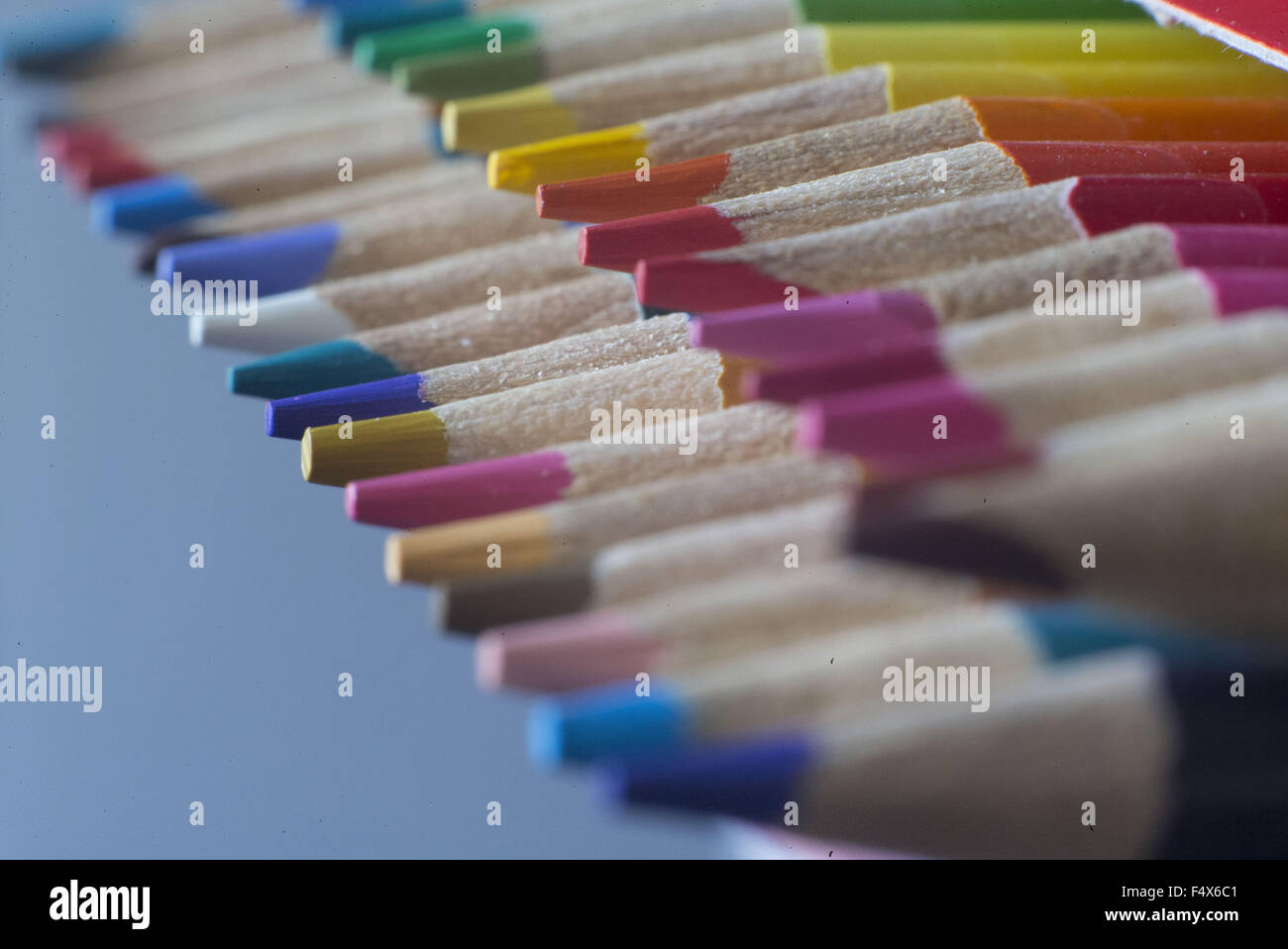 Colorful Crayons, Colored Pencils, Markers, Pens And Scissors In A Green  Box On A Desk Stock Photo, Picture and Royalty Free Image. Image 5247060.