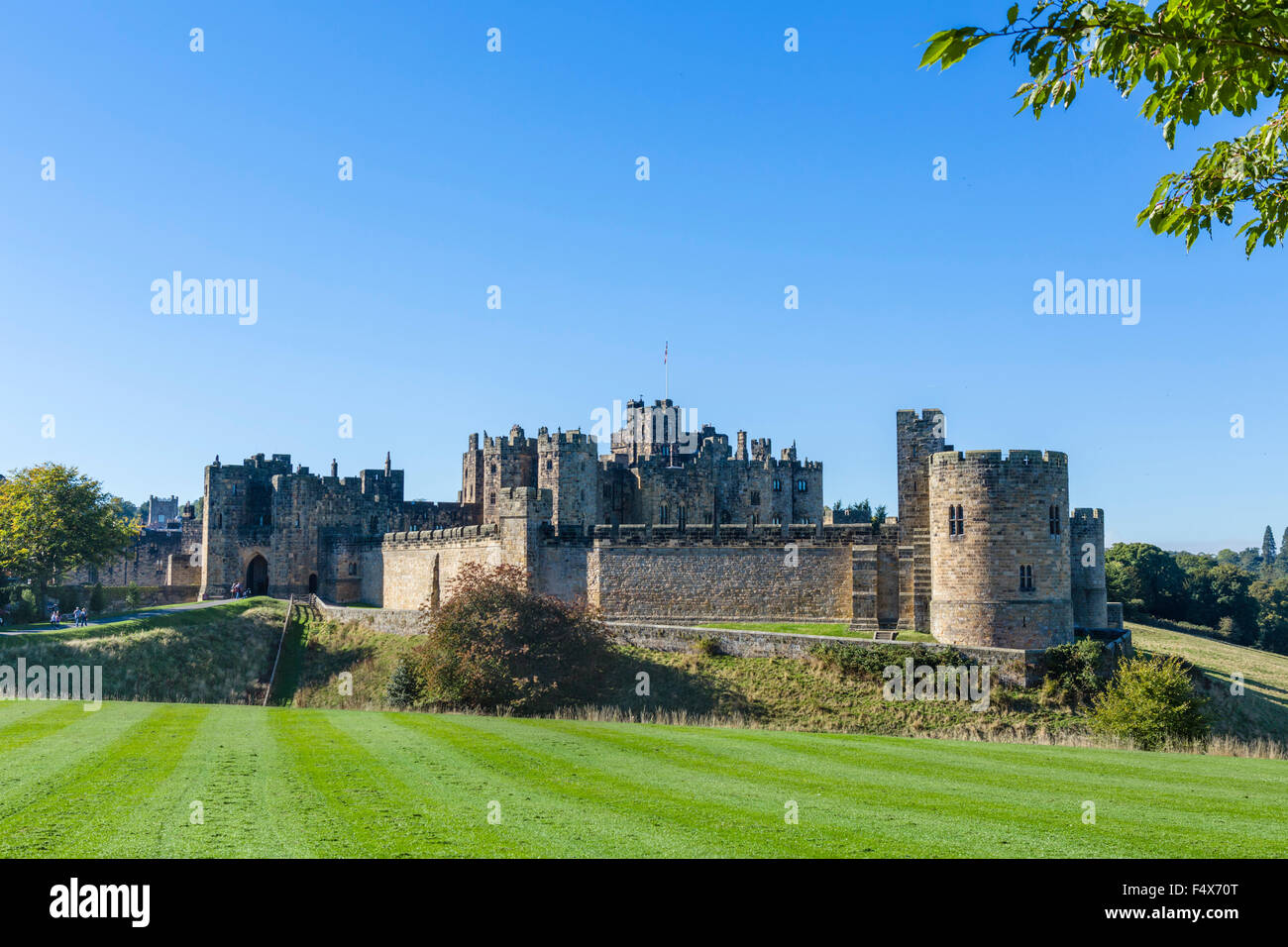 Alnwick Castle in autumn sunshine, Alnwick, Northumberland, England, UK Stock Photo