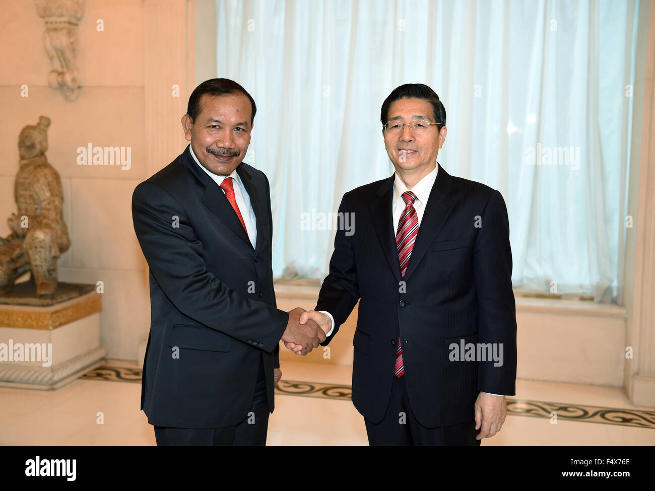 Beijing, China. 23rd Oct, 2015. Chinese State Councilor and Minister of Public Security Guo Shengkun (R) meets with Chief of Indonesian National Police General Badrodin Haiti attending the China-ASEAN Ministerial Dialogue on Law Enforcement and Security Cooperation, in Beijing, capital of China, Oct. 23, 2015. © Zhang Ling/Xinhua/Alamy Live News Stock Photo