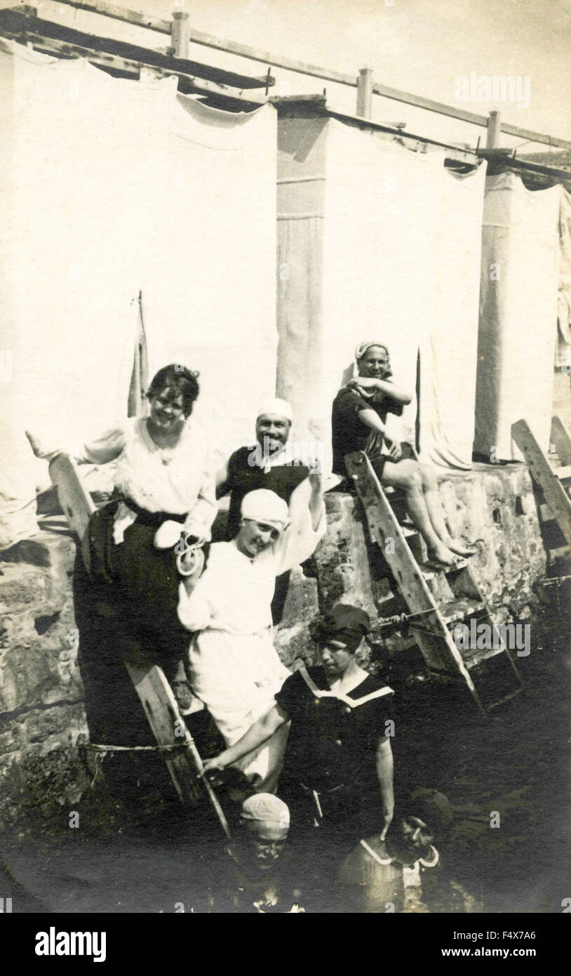 A small group bathing, Italy Stock Photo - Alamy
