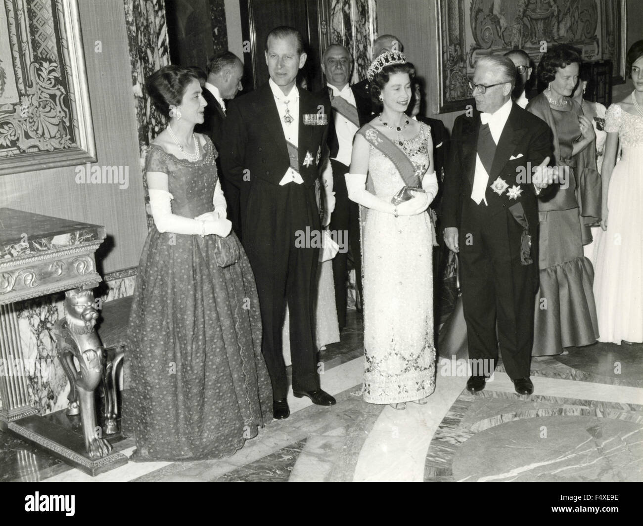 The Queen Elizabeth II and Prince Philip on a visit to Italy at a reception with the Italian President Giovanni Gronchi Stock Photo