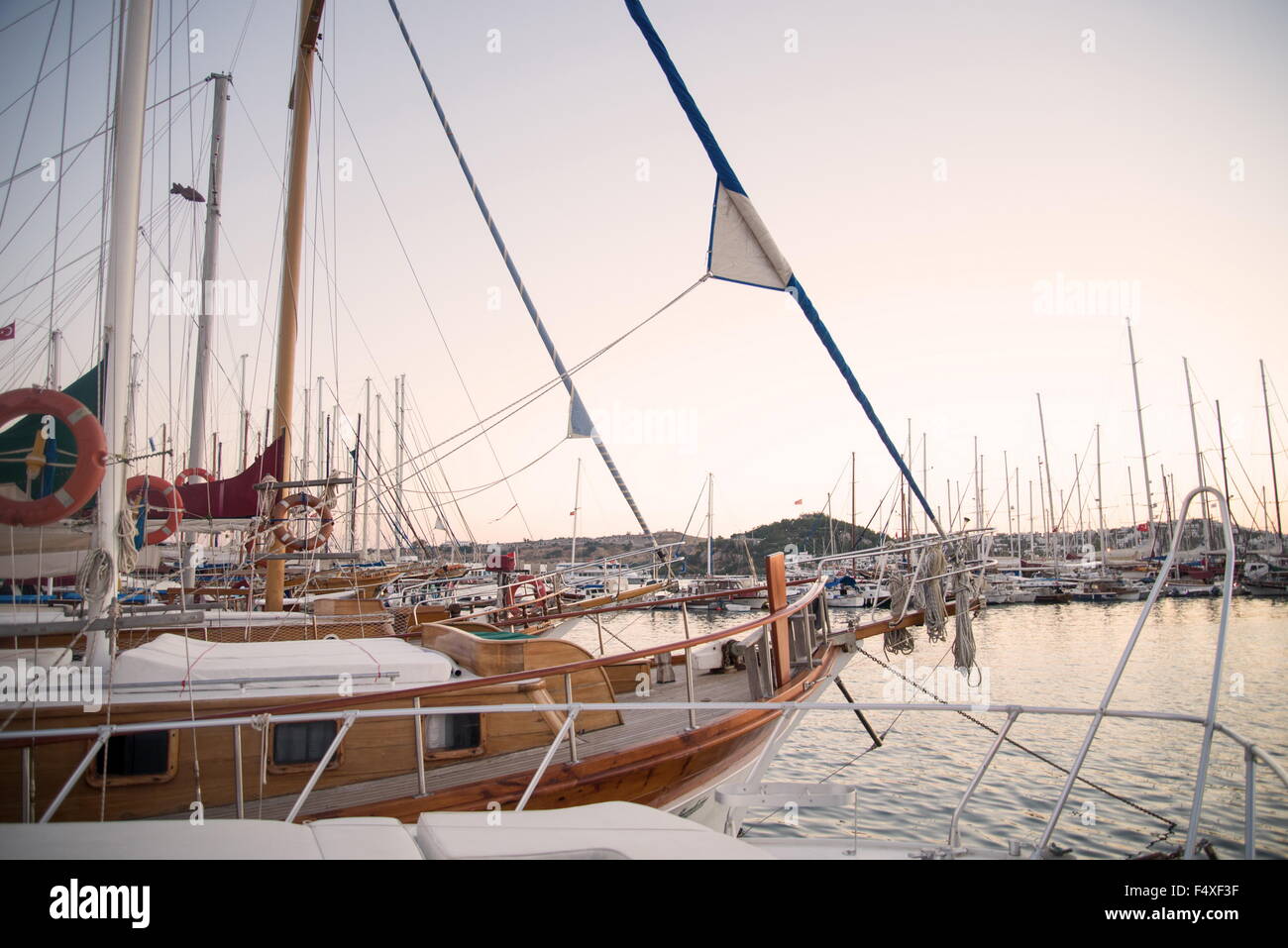 Marina with docked yachts at sunset in Turkey Stock Photo