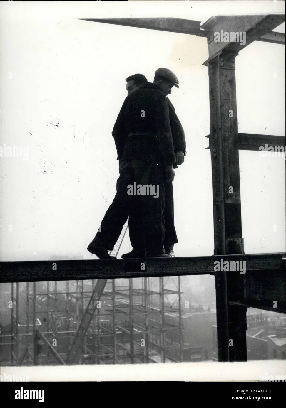 1968 - Positively No Passing - Except For Spidermen!: Probably the most anxious moment for cameramen if not for the steel erectors Jim Roach and Bill Henley, is when they have to pass such other out on the four-inch girder. There's a drill for this, rather like a dance movements. Right foot forward and left leg back. Take a little shuffle and move up close. Get the heads past and yours nearly there. Cameramen Drysdale reckoned this was the most terrifying thing of all to watch and photograph. © Keystone Pictures USA/ZUMAPRESS.com/Alamy Live News Stock Photo