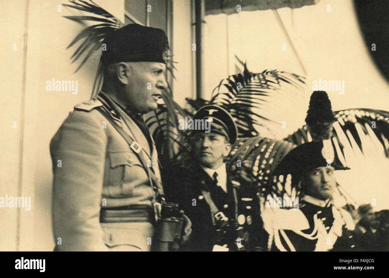 Benito Mussolini in uniform next to a Nazi official and a policeman Stock Photo