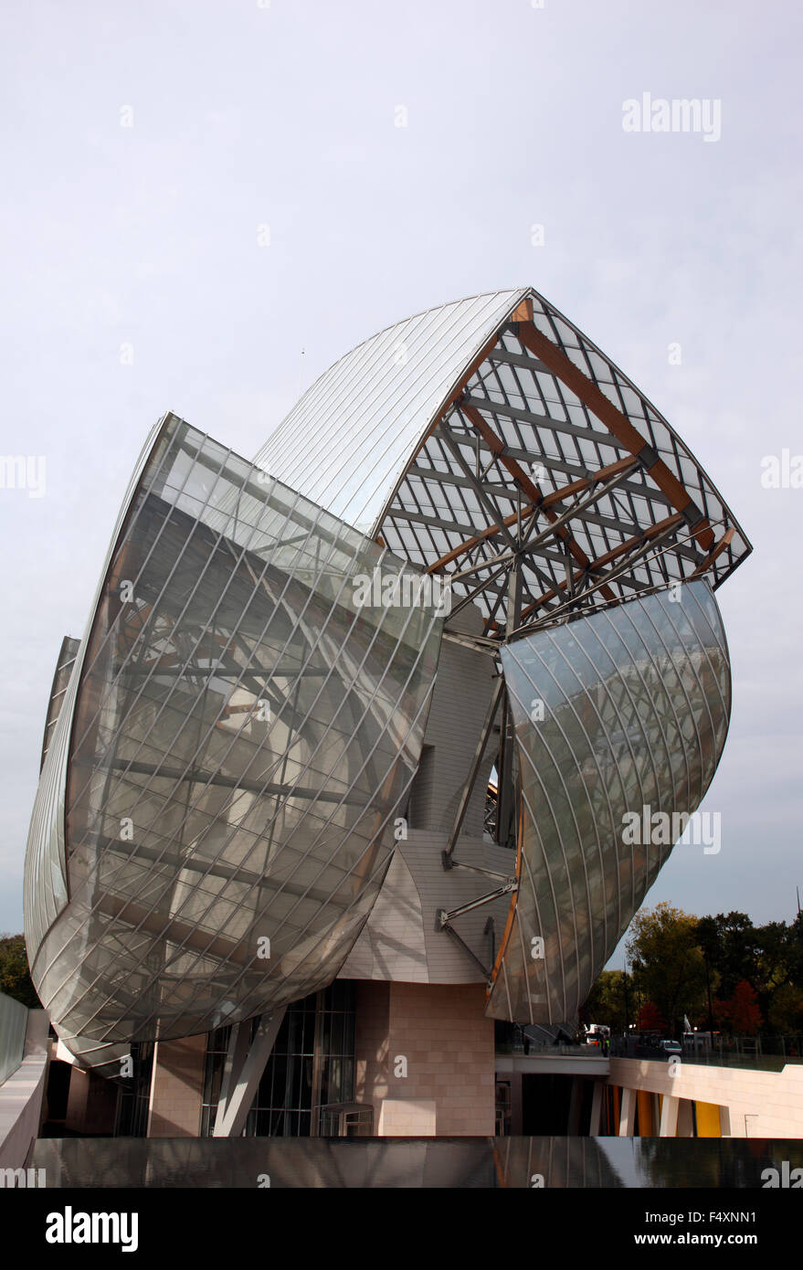 View of the Fondation Louis Vuitton museum, designed by Frank Gehry, with  colorful glass panes designed by Daniel Buren Stock Photo - Alamy