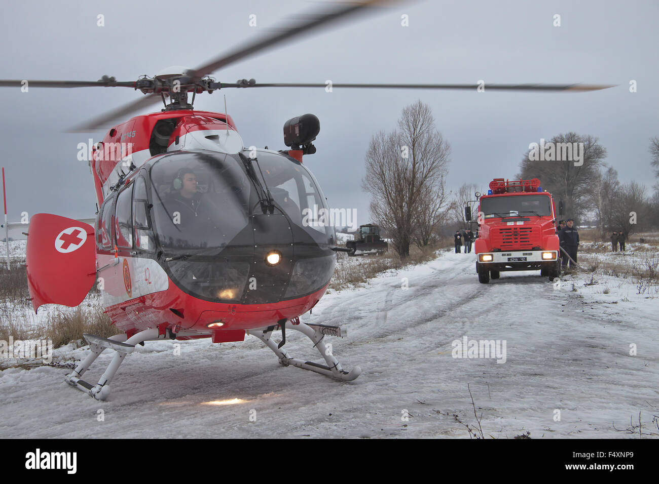 Nezhin, Ukraine - January 14, 2011: Ukrainian Ministry of Emergency Situations Eurocopter EC145 (BK-117) rescue helicopter lande Stock Photo
