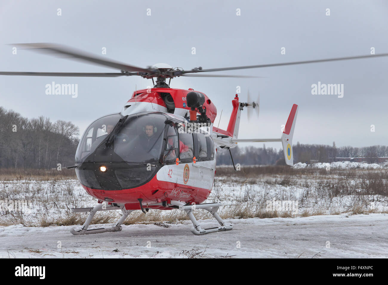 Nezhin, Ukraine - January 14, 2011: Ukrainian Ministry of Emergency Situations Eurocopter EC145 (BK-117) rescue helicopter takin Stock Photo